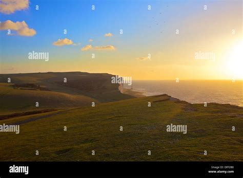 Beachy Head and Beachy Head Lighthouse at Sunset, East Sussex, England ...