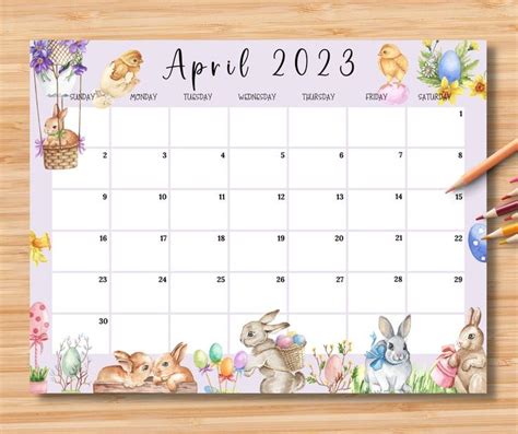 a calendar with an image of easter bunnies on it and pencils next to it