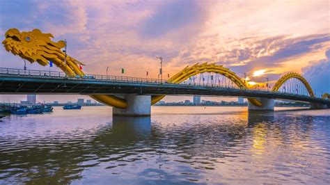 This is the Dragon Bridge, Da Nang, Vietnam (at night it literally ...