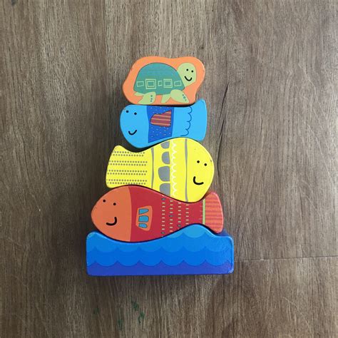 Fish stacking wooden toy, Hobbies & Toys, Toys & Games on Carousell