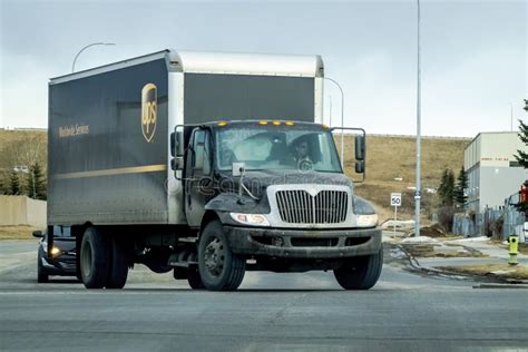 A UPS Truck Trailer Driving during the Winter Editorial Photo - Image ...