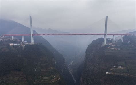 Beipanjiang Bridge, the world's highest, opens to traffic in rural China