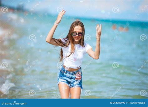 Little Happy Girl Splashing in Clear Turquoise Water Stock Photo - Image of summer, leisure ...