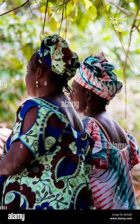 Back view of two Gambian dancers wearing Jola tribal dress at Makasutu ...