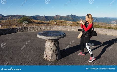 Woman Photographing a Directional Monument at Mount Saint Helens ...