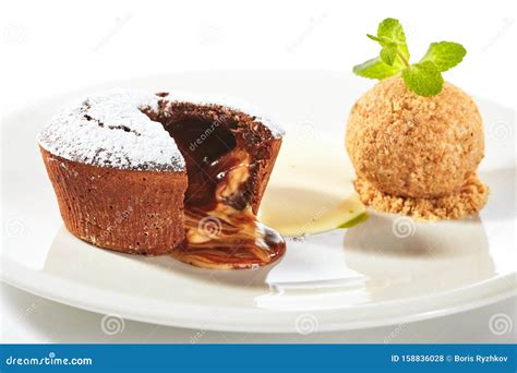 Whole Hot Chocolate Fondant with Ice Cream Ball Stock Photo - Image of food, plate: 158836028