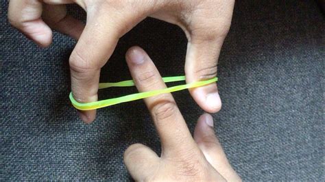 Rubber band magic trick with tutorial - YouTube