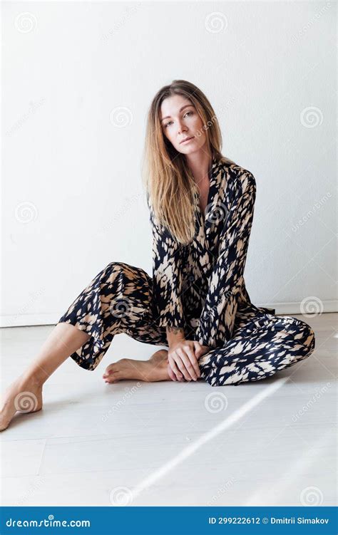 Woman Posing on the Floor in a Studio Room Stock Photo - Image of strength, wellbeing: 299222612