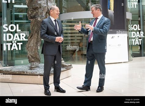 Labour leader Sir Keir Starmer (right) meets German Chancellor Olaf ...