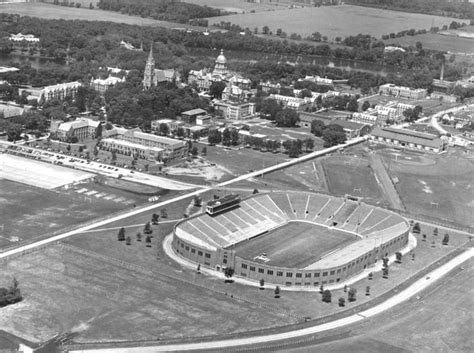 an aerial view of a stadium and surrounding buildings