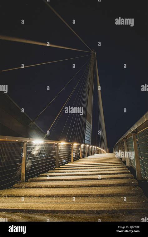 The illuminated Passerelle des Deux Rives bridge in Kehl, Germany in ...