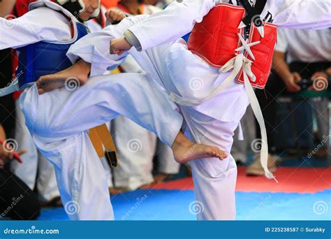 Kids Fighting on Stage during Taekwondo Contest Stock Image - Image of ...