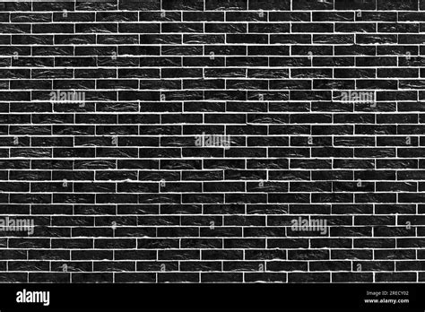 horizontal part of black painted brick wall .Abstract Black brick wall ...