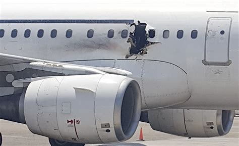 Plane hit by blast lands safely in Somalia, pilot describes incident - Chicago Tribune