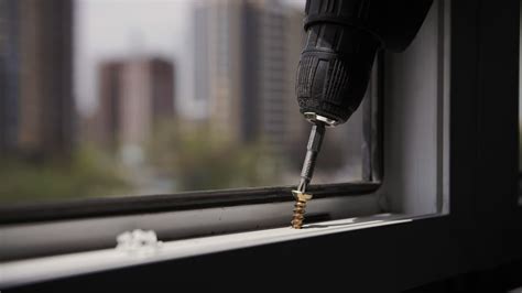 screwdriver screws screw, installation of window frame 36118681 Stock ...