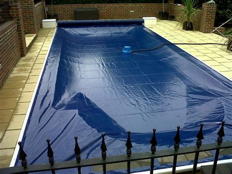 Aquamatic swimming pool safety covers