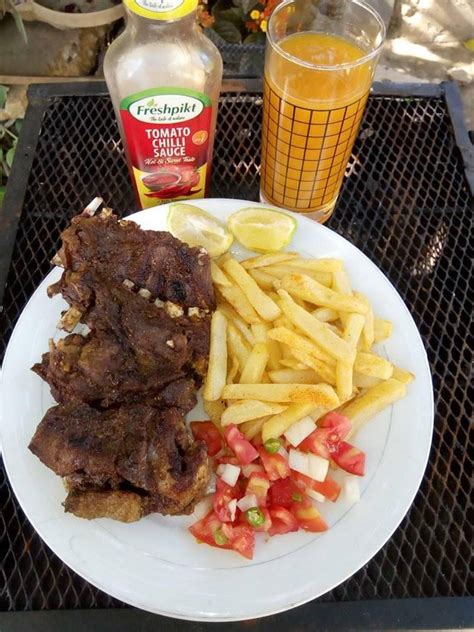 Roasted goat meat,Chips and kachumbari | World Recipes