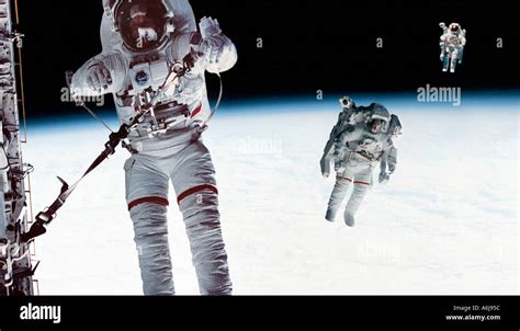 Astronauts floating hi-res stock photography and images - Alamy