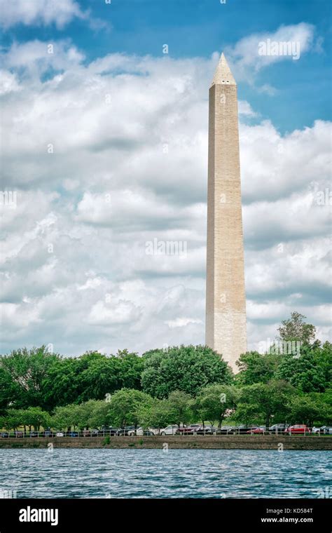 Washington Monument viewed from the tidal basin with water in the foreground. Washington DC ...