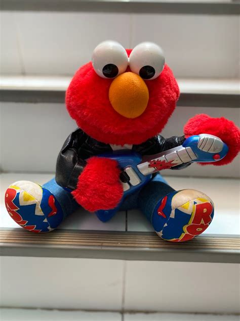 Elmo Rockstar, Hobbies & Toys, Toys & Games on Carousell