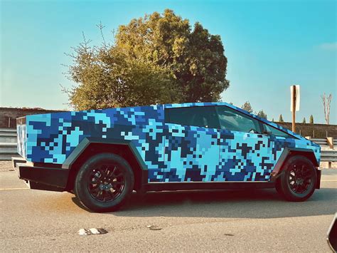 Cybertruck spotted with a blue-pixel pattern wrap, Tesla might just ...