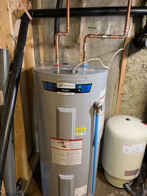 Installed new electric hot water tank in West Guilford