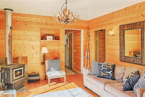 Wood paneling in rustic living room - Stock Photo - Dissolve