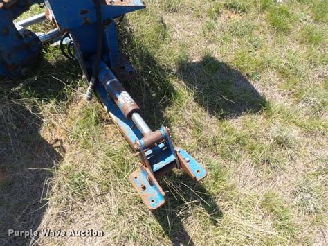 New Holland backhoe attachment in Granbury, TX | Item DE9544 sold | Purple Wave