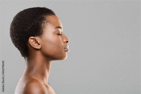 Profile portrait of black woman with perfect skin and closed eyes Stock ...