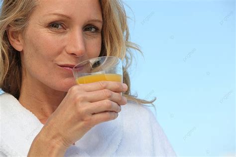 Woman Drinking Glass Orange Juice Photo Background And Picture For Free ...
