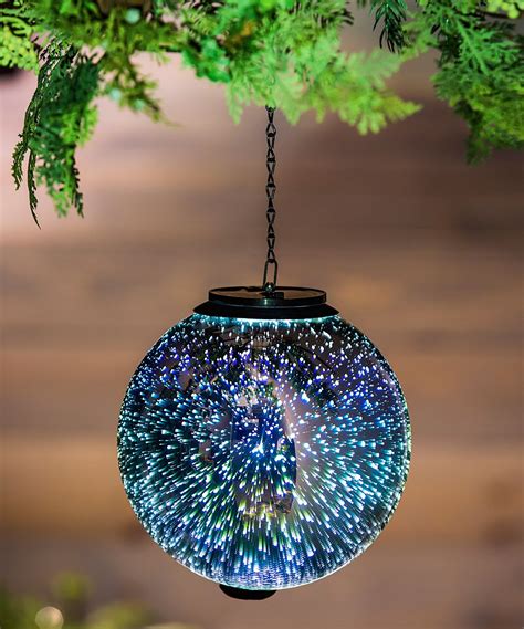 Silver Starburst Solar-Powered Hanging Orb Décor | Zulily | Solar ...