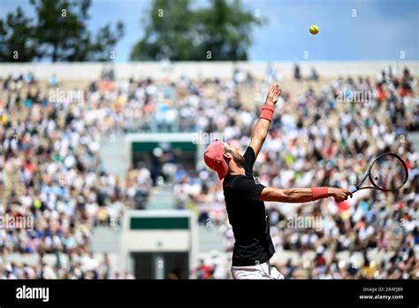 Illustration with Karen Khachanov serving during the French Open, Grand ...