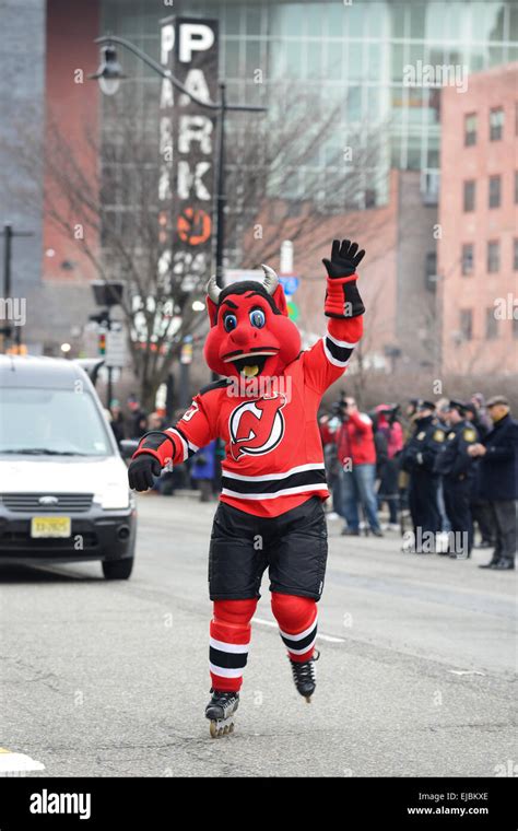 New Jersey Devil's hockey team mascot greeting fans during the 2013 St ...