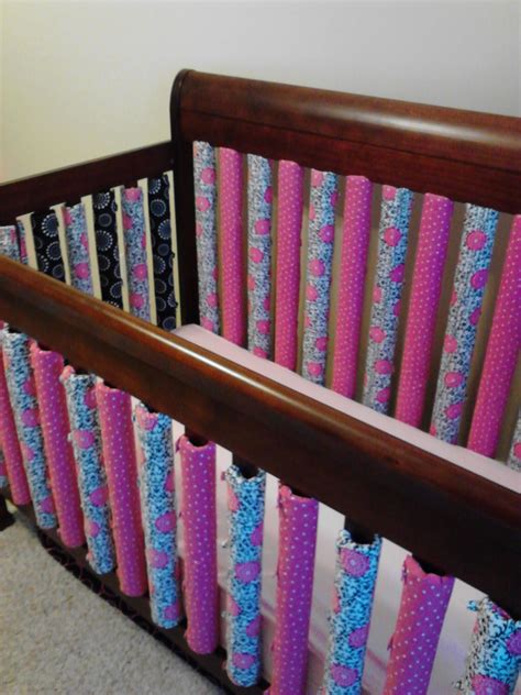 Handmade vertical crib bumpers from www.facebook.com/sewadorablebaby ...