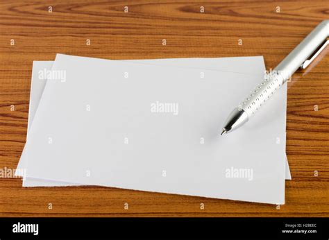 pen with white paper Stock Photo - Alamy