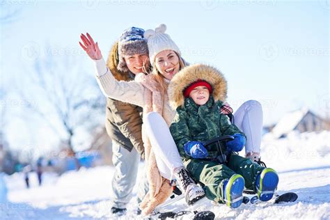 Nice happy family having fun on winter snow 15853678 Stock Photo at ...