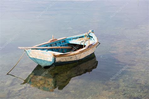 Wooden row boat Stock Photo by ©ivonnewierink 3021174