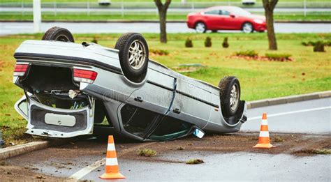 Car Crash Accident on Street. Damaged Upside Down Automobile Stock Photo - Image of rescue ...