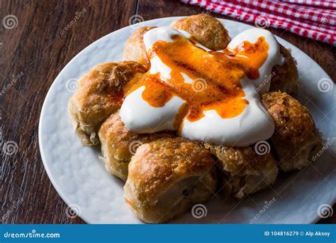 Bosnian Pastry Manti with Yogurt and Fried Butter Sauce / Bosnak Borek Stock Image - Image of ...