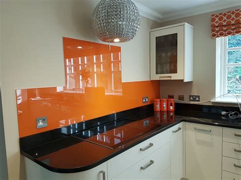 Bright orange coloured painted kitchen splashback. | White kitchen ...