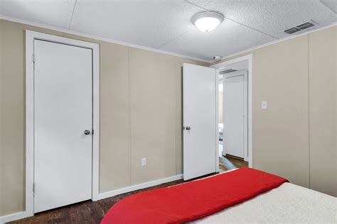 7390 New Era Rd_117 northeast bedroom with hall door open | Urban Property