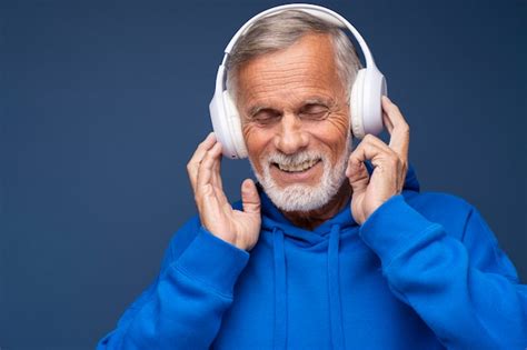 Premium Photo | Close up senior man wearing headphones