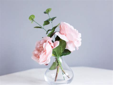 Blush pink roses and eucalyptus in our mini bud vase. Perfect! # ...