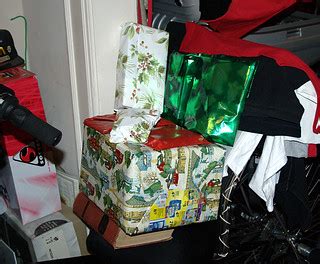 Gifts | Pile o' gifts, festively set upon the seat of a recu… | Flickr