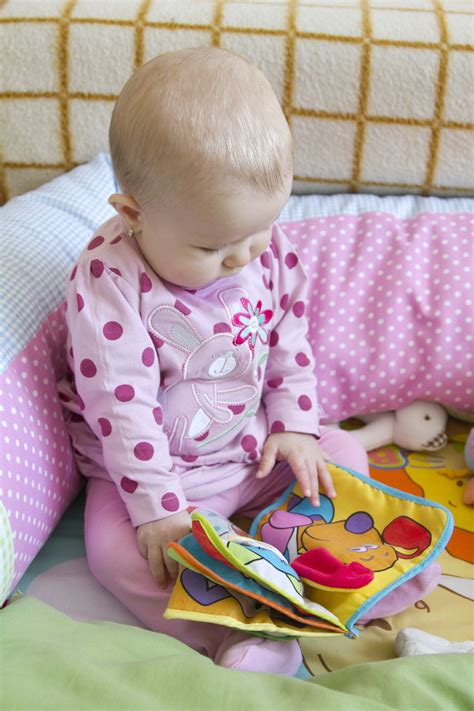 Baby Looking At The Book Free Stock Photo - Public Domain Pictures