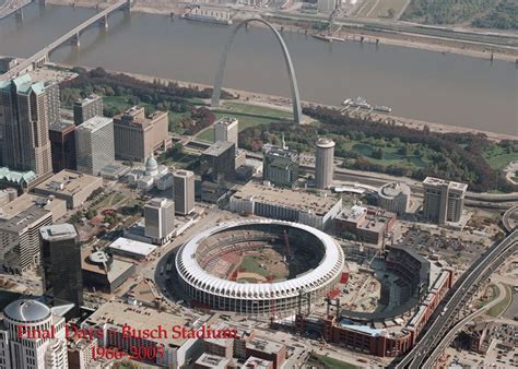 Oblique aerial photography of downtown St. Louis with the Gateway Arch and the old Busch Stadium ...