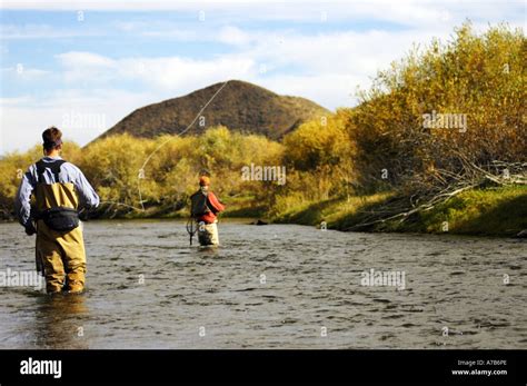 Idaho Mackay Big Lost River Two men fly fishing in the autumn Stock ...