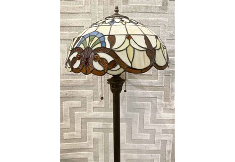 TIFFANY STYLE FLOOR LAMP, 150cm H, together with a matching Tiffany style table lamp, 60cm H. (2)