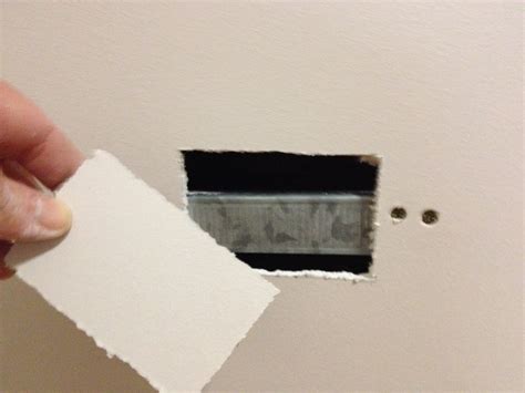 How to repair a power point hole in a plaster wall ready for painting. | TMZ Painting