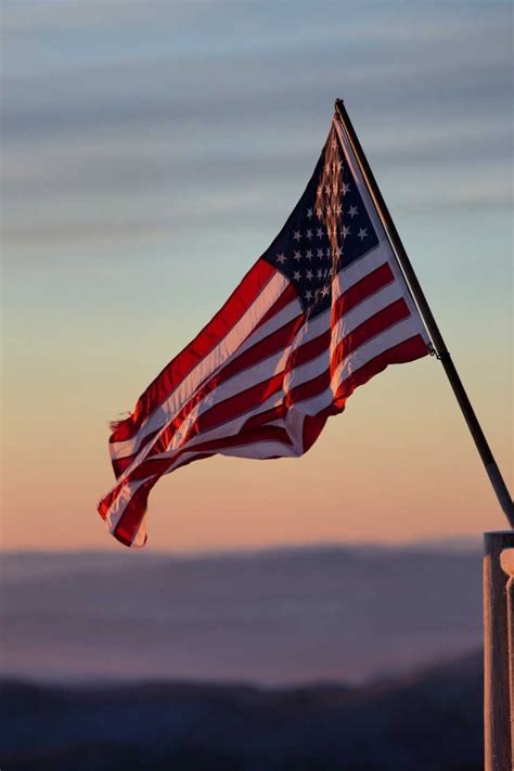 The Spirit of Patriotism - CoziNest | American flag wallpaper, American flag, Flag